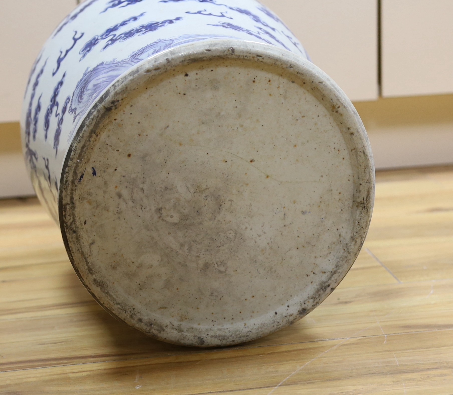 A 19th century Chinese large blue and white 'dragon' jar and cover, 63cms high